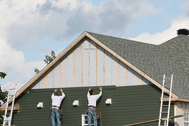 Professional Vinyl Siding technician working in North Wales, PA